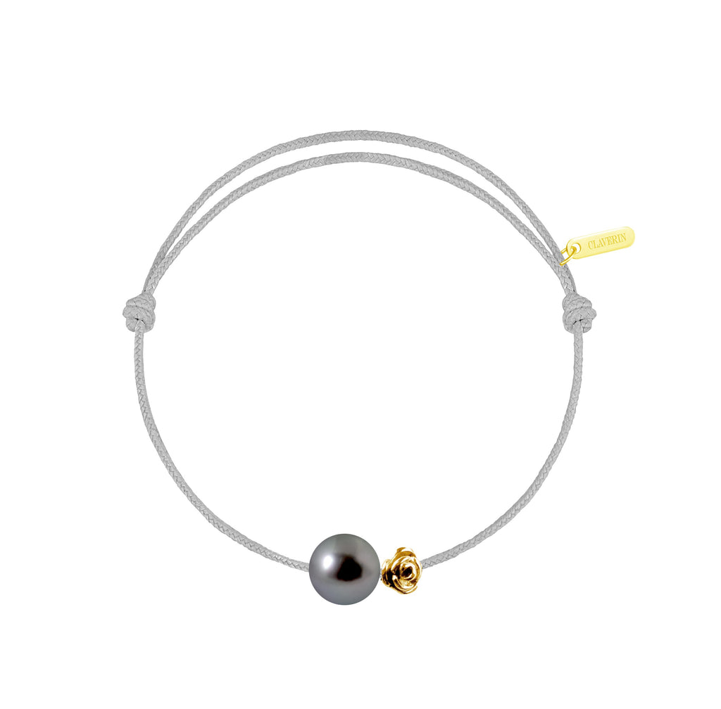 Pearly gold flower perle noire cordon gris perle