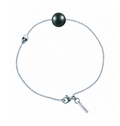 Bracelet Claverin pour homme avec perle noire de Tahiti, motif tête de mort et chaîne en or blanc 18 carats