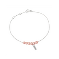 Bracelet Claverin en or blanc avec six perles roses délicates et une fine chaîne ajustable