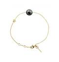 Bracelet Claverin en or jaune 18 carats avec perle noire de Tahiti et motif étoile serti d'un diamant