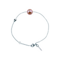 Bracelet Claverin en or blanc 18 carats avec perle rose et motif tête de mort sur fine chaîne ajustable