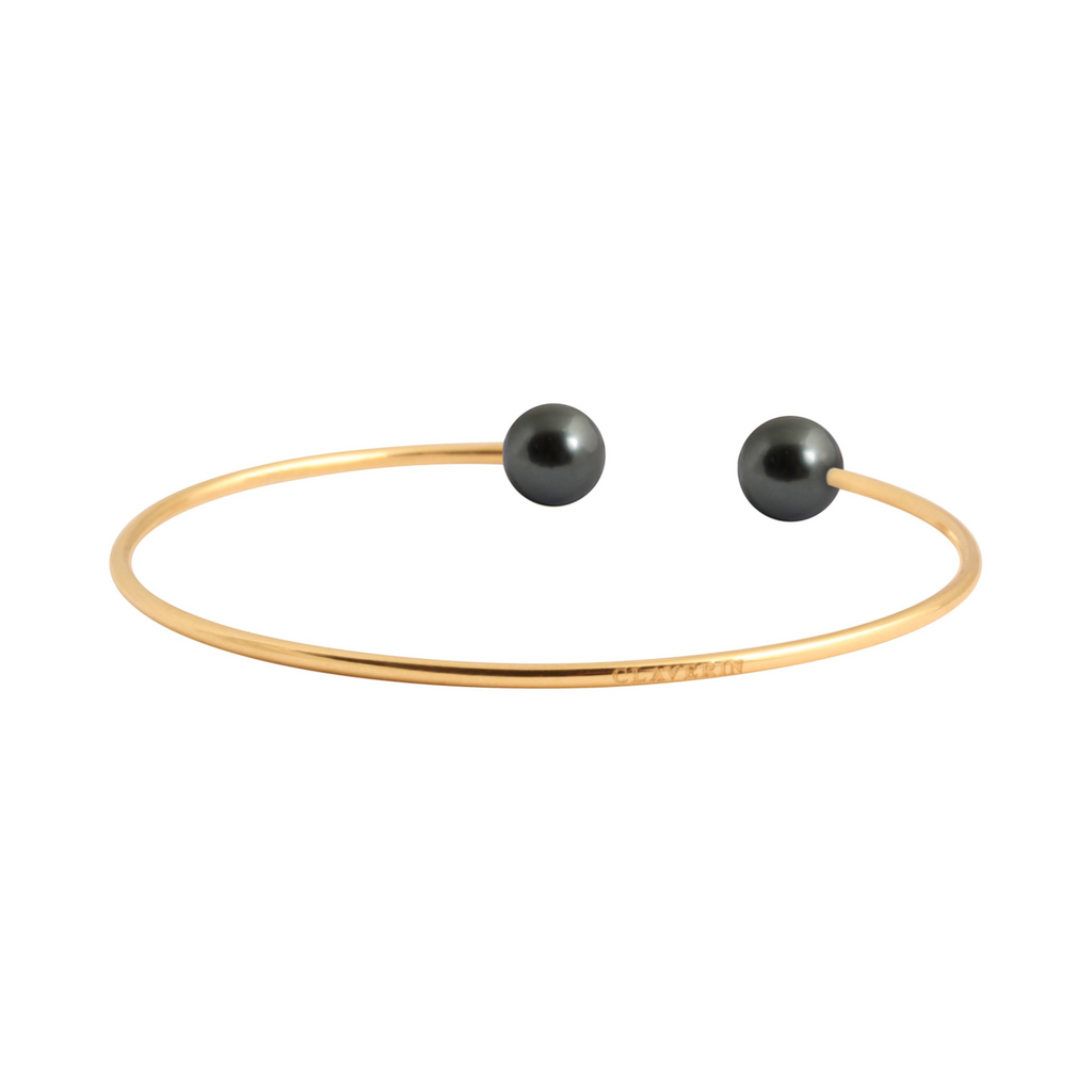 Bracelet jonc Claverin souple en or jaune 18 carats avec deux perles noires élégantes de la collection Pure