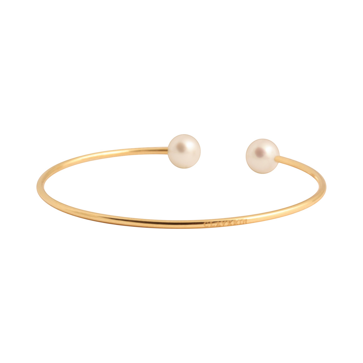 Bracelet jonc souple Claverin en or jaune 18 carats orné de deux perles blanches élégantes